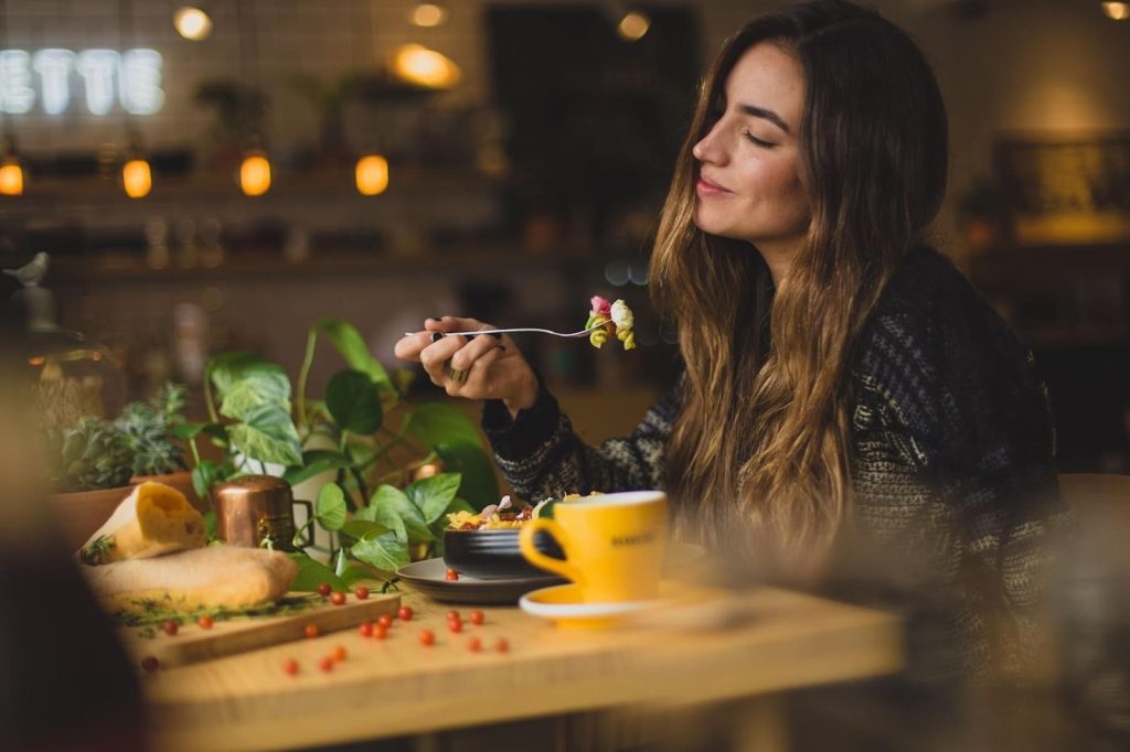 Why Bone Recovery is Important for Lifelong Health 3 woman holding fork
